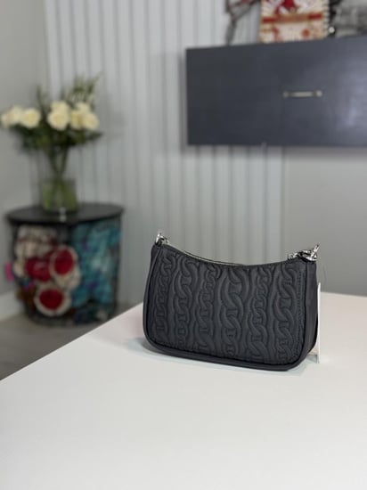 شنطة دكني لورينا هوبو سمول بوليستر سجنشر DKNY LORENA SHOULDER BAG