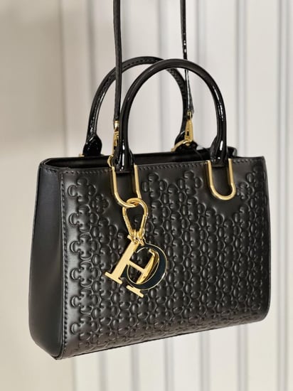 كارولينا هيريرا توب هاندل