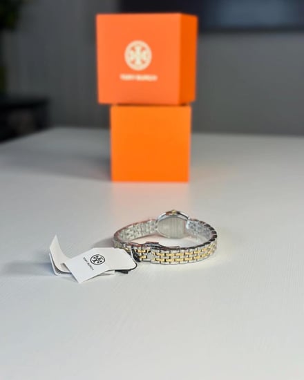 توري برتش ساعه OVAL WATCH بيضاويه انيقه بلونين - ذهبي/ فضي