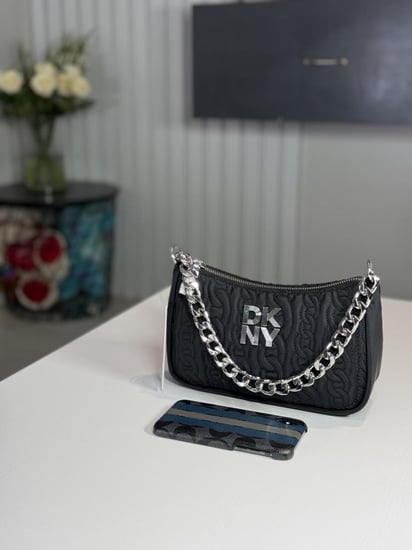 شنطة دكني لورينا هوبو سمول بوليستر سجنشر DKNY LORENA SHOULDER BAG