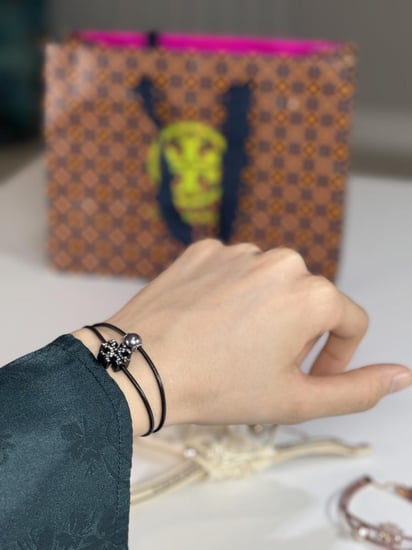 خاتم توري برتش ايلانور باون ذهبي وعلامة توري برتش - gold tory burch ELEANOR RING