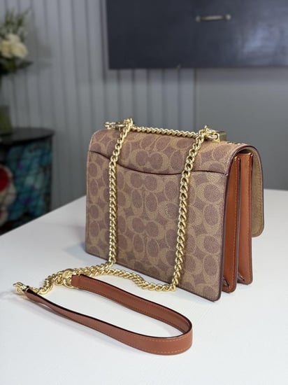 كوتش كلير بطبعة روز Klare Crossbody With roses Bag coach