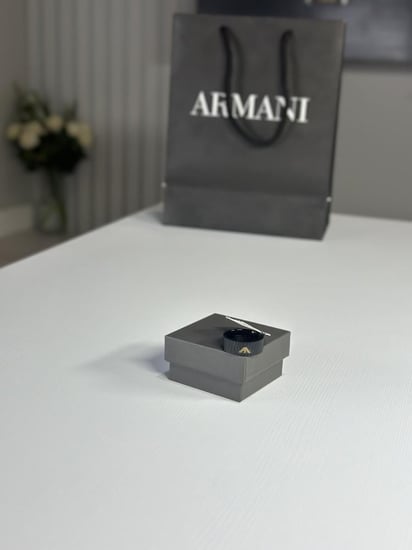 خاتم مقاس 11 ارماني رجالي معدني بتصميم مموج مودرن وعلامه ارماني ذهبيه