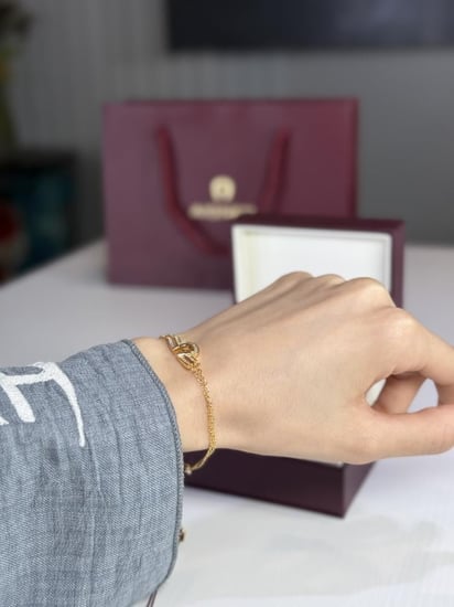 اسوار اجنر ذهبي بعلامه عريضه A بالكريستال Aigner gold fashion bracelet crystal logo