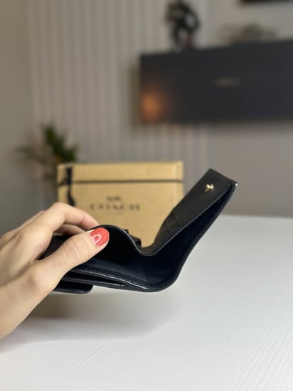 محفظه كوتش لوقو ذهبي- اسود