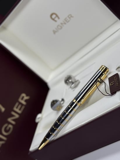 طقم اجنر ذهبي / ستيل كبك وقلم