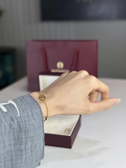 اسوار اجنر ذهبي دوروتا بعلامة احنر Aigner Dorotea gold bracelet