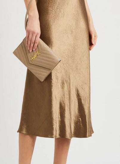 باوتش سان لورين بجلد فخم وتفاصيل ذهبيه CASSANDRE MATELASSÉ FLAP POUCH IN GRAIN DE POUDRE LEATHER- بيج غامق