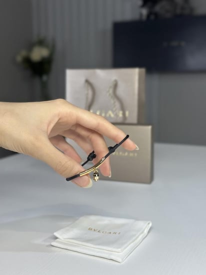 اسوار بولقاري SERPENTI FOREVER BRACELET قطن بتصميم ميداليه راس ثعبان- اسود/ ذهبي