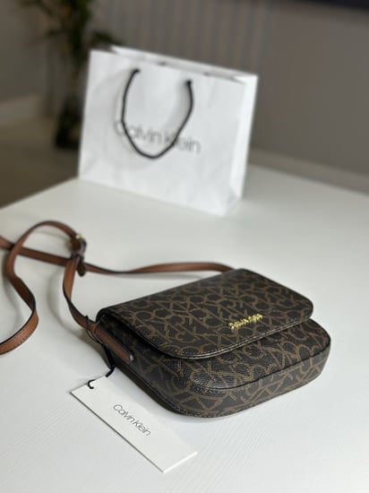 كالفن كلاين كروس مون ريتشل - بني سجنشر