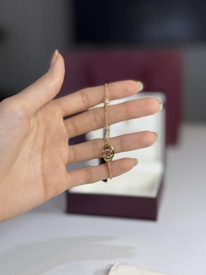 اسوار اجنر ذهبي دوروتا بعلامة احنر Aigner Dorotea gold bracelet