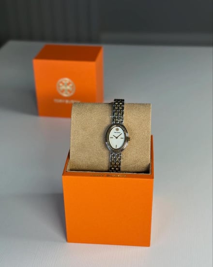 توري برتش ساعه OVAL WATCH بيضاويه انيقه بلونين - ذهبي/ فضي