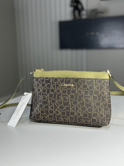 شنطة كالفن كلاين كروس بودي سفيانو بلوك- زيتي / بني سجنشر