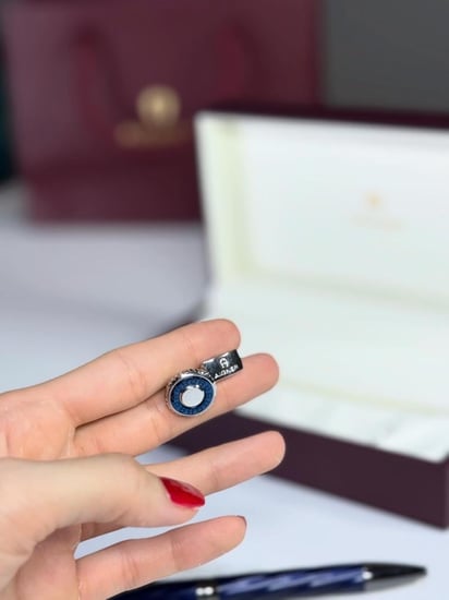 اجنر طقم قلم ريمر وكبك فضي بحواف كحليه