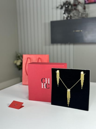 طقم كارولينا شين تاسل بلون ذهبي ولولو ابيض