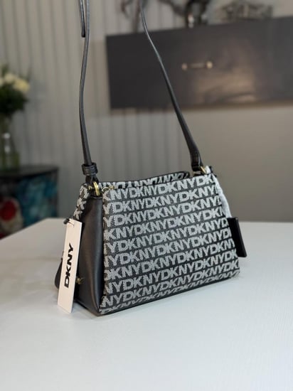 شنطة دكني BRYANT DOME CBODY براينت كروس بودي بلون اسود سجنشر