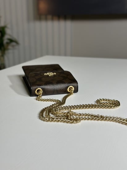 كوتش كروس بودي شنطة جوال - بني سجنشر