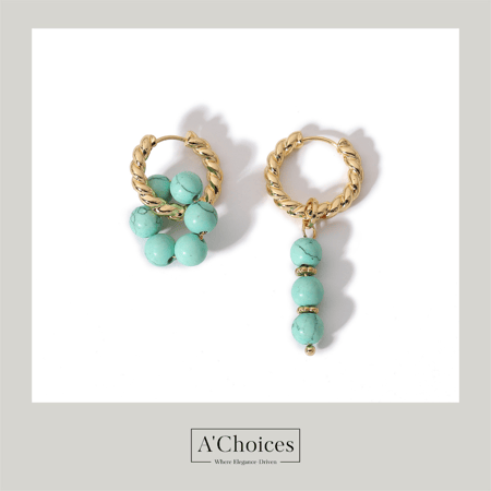 اقراط ذهبية مزينة باحجار كريمة بتصميم معاصر