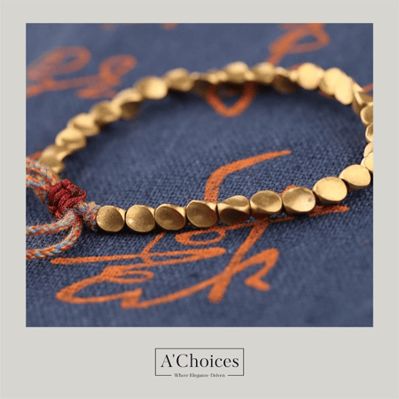 اساور مصنوعة من النحاس المطلي بالذهب بأشكال مموجة - سحب