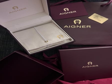 كبك من اجنر للرجال مع الشعار استيل لون فضى واخضر