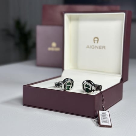 كبك من اجنر للرجال مع الشعار استيل لون فضى واخضر