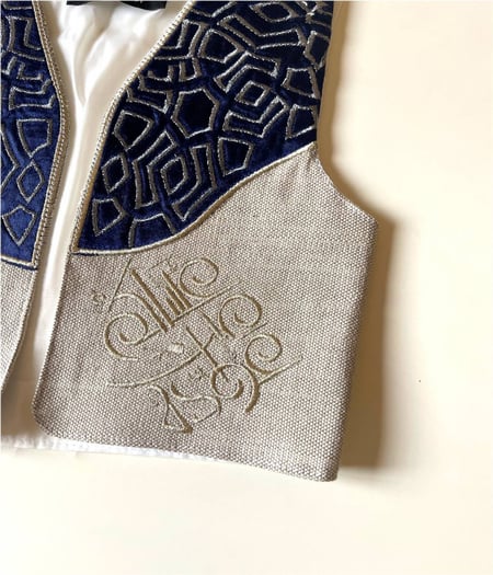 سديري العيد مطرز بعبارة ( عساكم من عواده ) كحلي