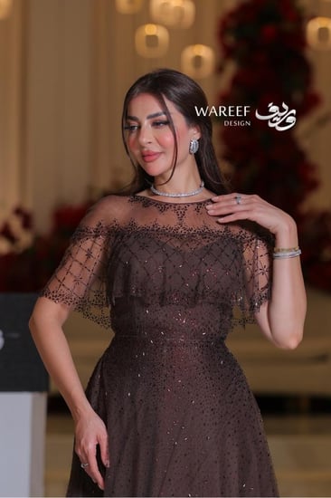 فستان بيج مزين بالتطريز الفخم