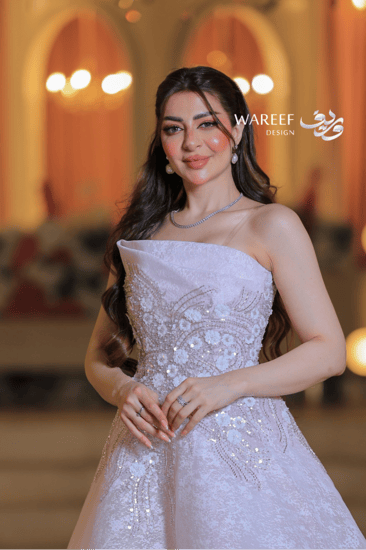 فستان سهرة زهري مطرز بخرز لامع