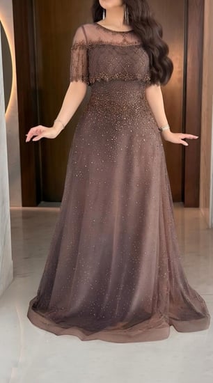 فستان بيج مزين بالتطريز الفخم