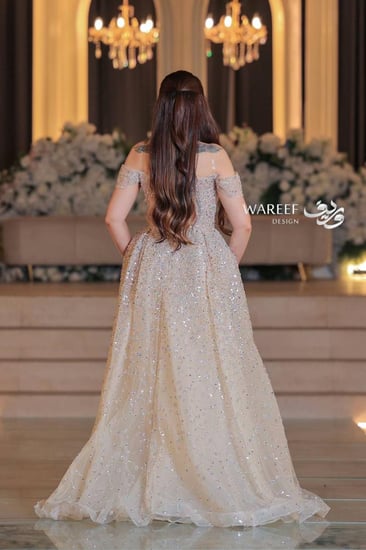 فستان سهرة بيج أوف شولدر بتطريز يدوي لامع وفخامة أنيقة