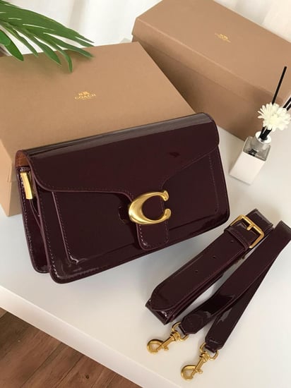 شنطة كوتش خمري لامعة كلاسيك