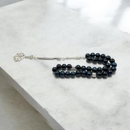 سبحه حجر عين النمر كحلي غامق