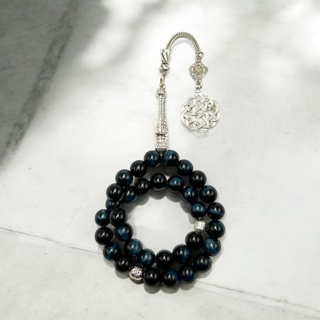 سبحه حجر عين النمر كحلي غامق