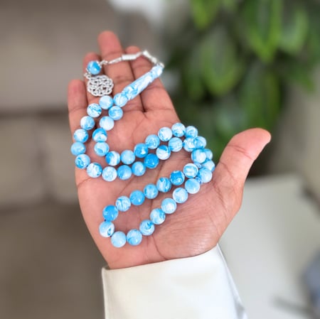 سبحة من بكلايت باللون السماوي المخلوط