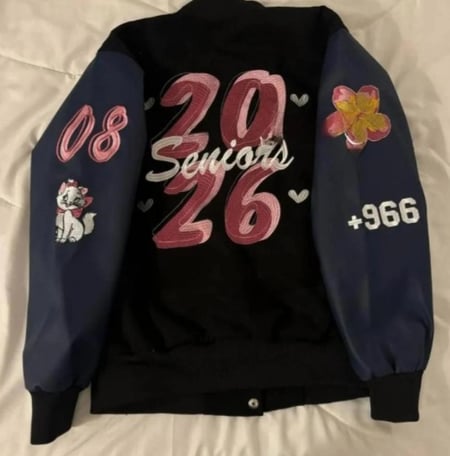 جاكيت سينيور اسود اكمام كحلي جلد