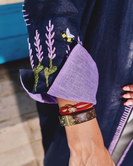 عبايه كحلي ورده الخزامى