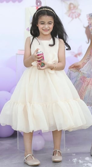 فستان لؤلؤي بفيونكه