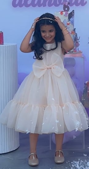 فستان لؤلؤي بفيونكه