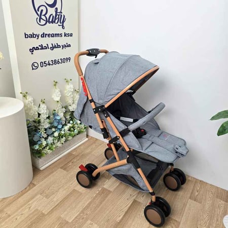 عربة أطفال أنيقة بتصميم مميز
