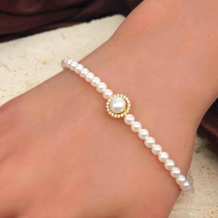 اسوارة لولو طبيعي بتصميم الماسي ذهب عيار 18 حجم وسط