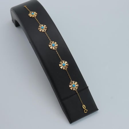 احصلى على طقم ذهب عيار 21 بتصميم رموش فيروزي وزن 8.1 جرام