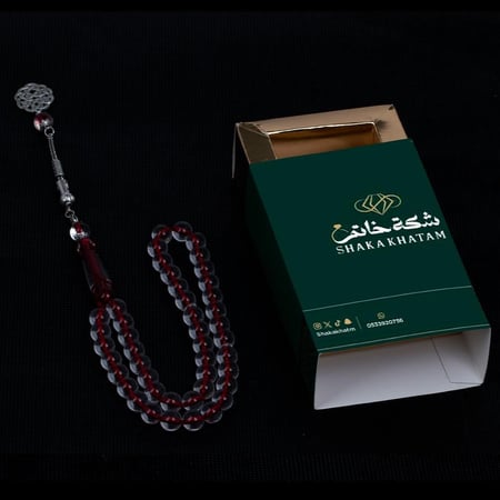 سبح بكلايت شفاف خيط عنابي 45 خرزة طربون راديوم
