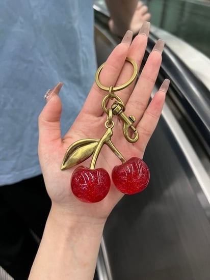 Coach cherry charm