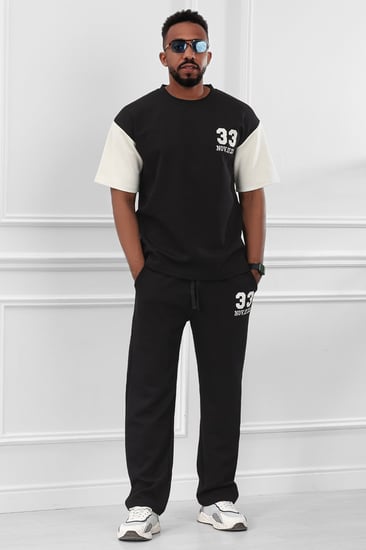 طقم رجالي اوفر سايز مكون من تيشرت بطبعة و بنطال