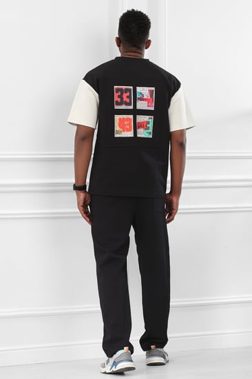 طقم رجالي اوفر سايز مكون من تيشرت بطبعة و بنطال