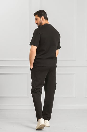 طقم رجالي أوفر سايز نص كم بنطال طويل بجيب جانبية ولون موحد