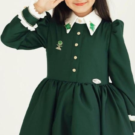 فساتين اليوم الوطني مع قبعه بي لون الخضر