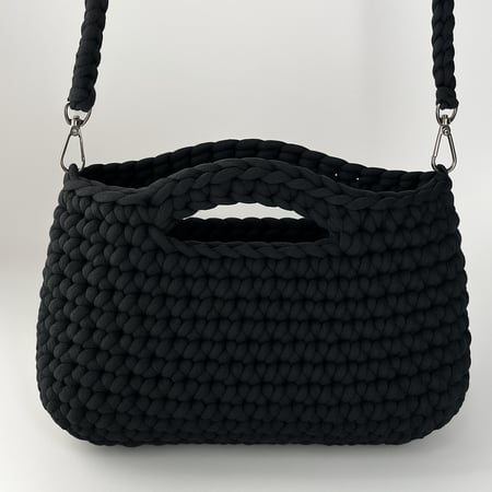 حقيبة يد لون واحد