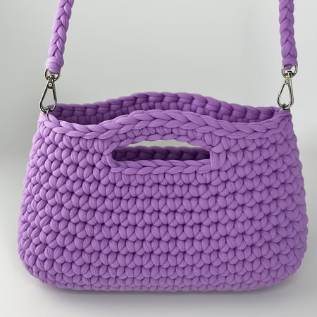 حقيبة يد لون واحد