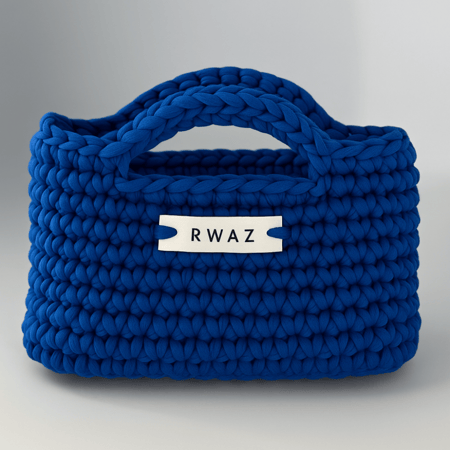 حقيبة يد مسكتين لون واحد